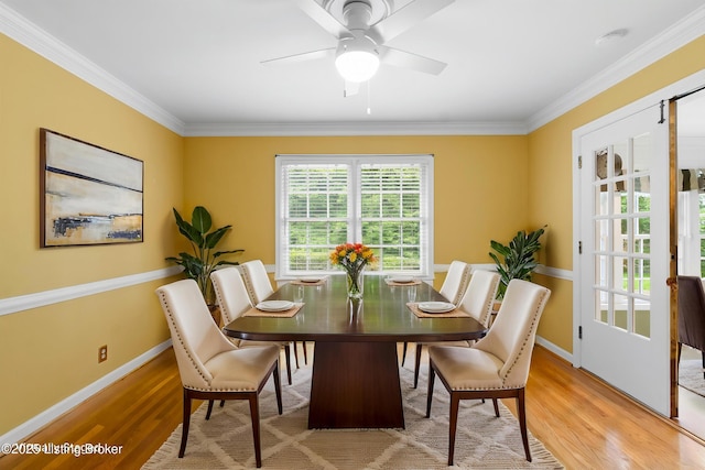 2224 Wynnewood Cir, Louisville, KY 40222 - dining room with light wood-style floors, crown molding, baseboards, and a ceiling fan