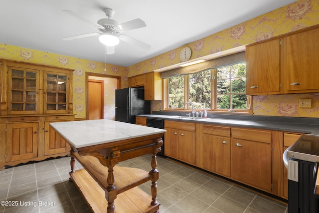 2224 Wynnewood Cir, Louisville, KY 40222 - kitchen with black appliances, wallpapered walls, a sink, brown cabinets, and ceiling fan