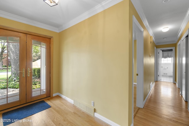 2224 Wynnewood Cir, Louisville, KY 40222 - doorway to outside with french doors, light wood finished floors, plenty of natural light, and ornamental molding