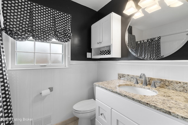2224 Wynnewood Cir, Louisville, KY 40222 - bathroom featuring wainscoting, toilet, vanity, and a shower with shower curtain