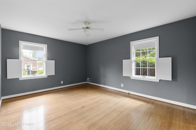 2224 Wynnewood Cir, Louisville, KY 40222 - spare room featuring ceiling fan, wood finished floors, and baseboards