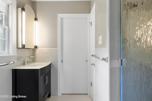 2224 Wynnewood Cir, Louisville, KY 40222 - bathroom with tile walls, wainscoting, a shower stall, and vanity