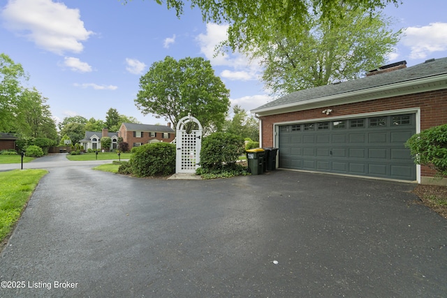2224 Wynnewood Cir, Louisville, KY 40222 - garage featuring driveway