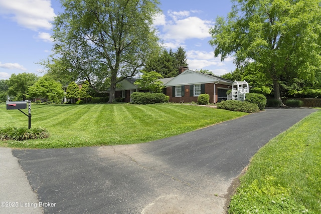 2224 Wynnewood Cir, Louisville, KY 40222 - single story home with a front lawn and asphalt driveway