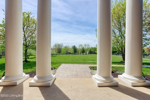 view of patio / terrace featuring fence