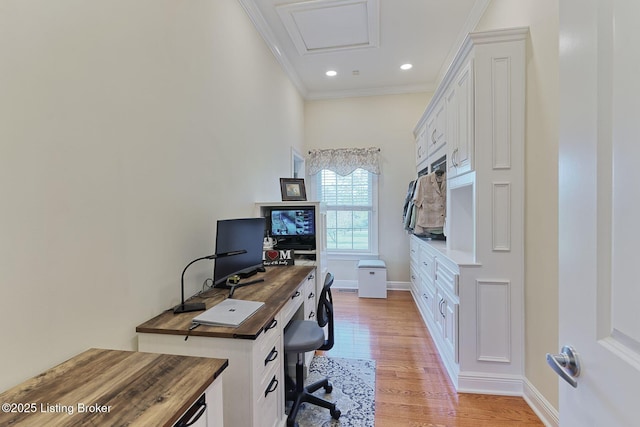 office space with crown molding, recessed lighting, baseboards, and light wood finished floors