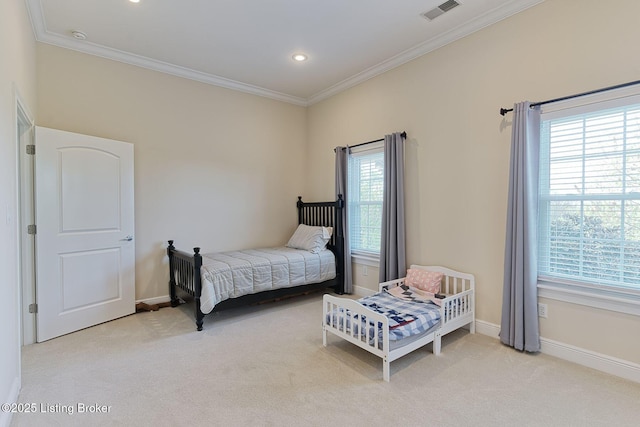 carpeted bedroom with visible vents, recessed lighting, baseboards, and crown molding