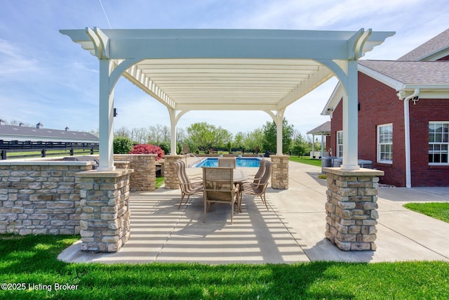 view of patio / terrace featuring a pergola and an outdoor pool