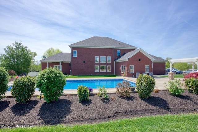 outdoor pool featuring a patio area