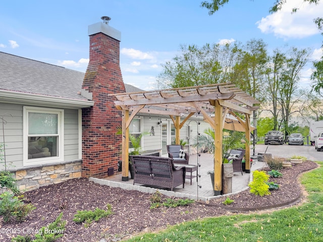 view of patio with a pergola and an outdoor living space