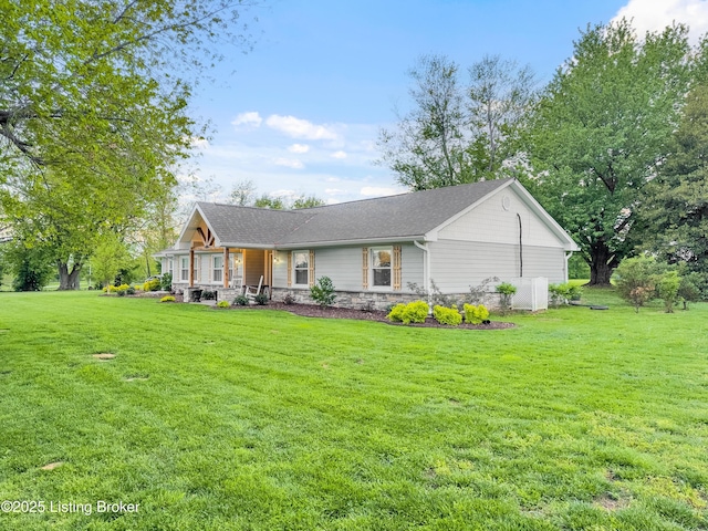 ranch-style house featuring a porch, stone siding, and a front yard