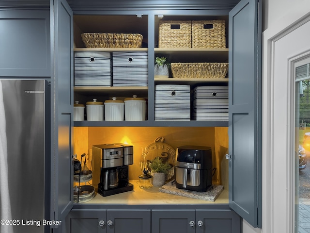 interior space featuring freestanding refrigerator