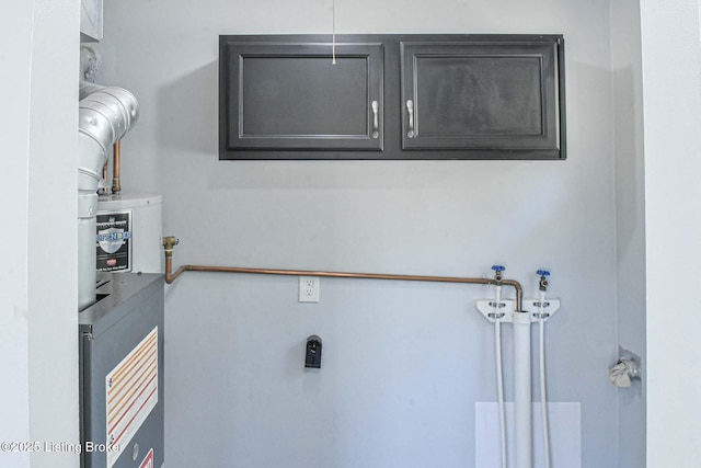 laundry area featuring cabinet space and hookup for a washing machine