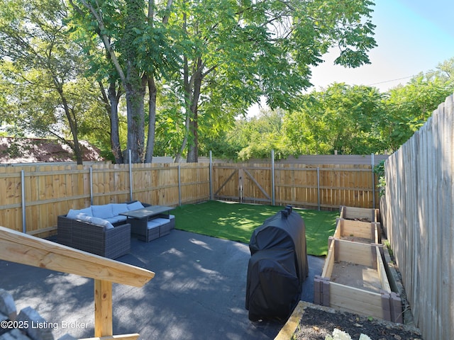 view of patio with a fenced backyard and an outdoor hangout area