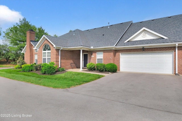 10002 Brownsboro Gardens Cir, Louisville, KY 40241 - view of front of property with roof with shingles, an attached garage, a front lawn, brick siding, and driveway