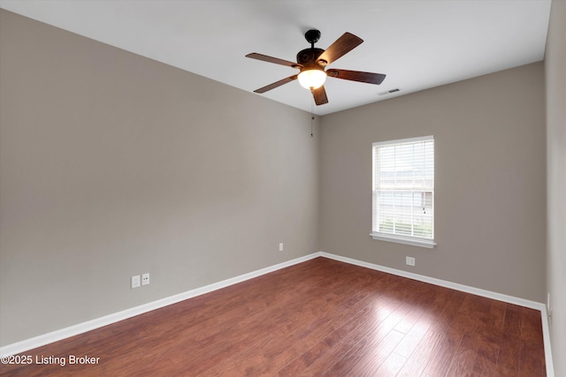 10002 Brownsboro Gardens Cir, Louisville, KY 40241 - unfurnished room with baseboards, ceiling fan, visible vents, and dark wood finished floors