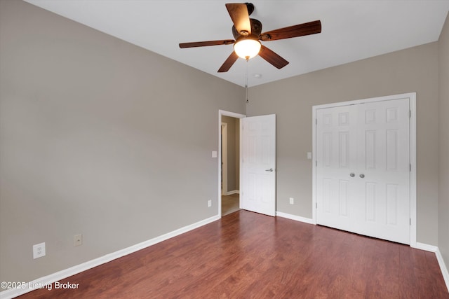 10002 Brownsboro Gardens Cir, Louisville, KY 40241 - unfurnished bedroom with baseboards, ceiling fan, wood finished floors, and a closet