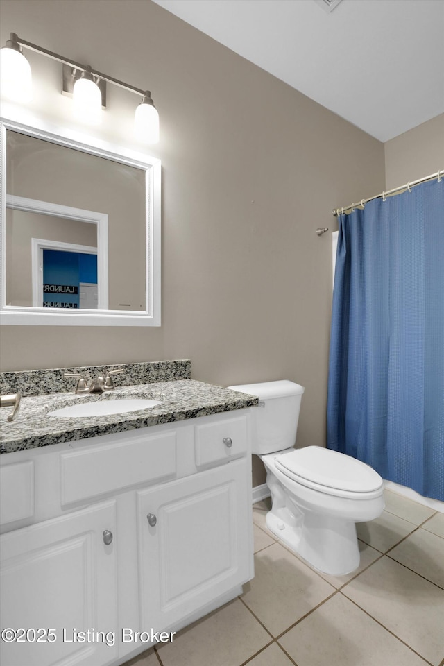 10002 Brownsboro Gardens Cir, Louisville, KY 40241 - full bathroom with tile patterned flooring, curtained shower, toilet, and vanity