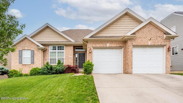 220 Rockcrest Way, Louisville, KY 40245 - view of front of home with concrete driveway, a front yard, an attached garage, and brick siding