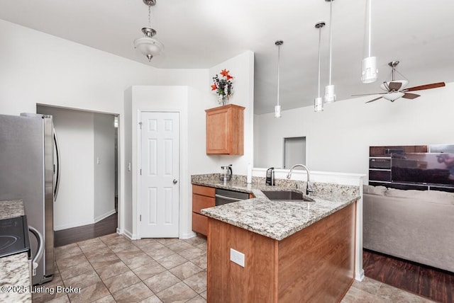 220 Rockcrest Way, Louisville, KY 40245 - kitchen featuring a sink, ceiling fan, a peninsula, stainless steel appliances, and open floor plan