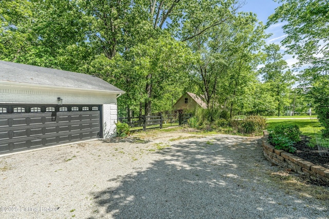 3003 Coffee Tree Ct, Crestwood, KY 40014 - garage with view of scattered trees