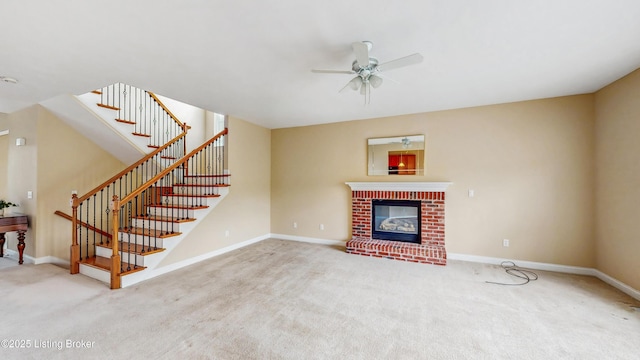 unfurnished living room featuring stairway, baseboards, carpet, and a ceiling fan
