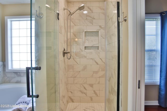 full bathroom with a shower stall