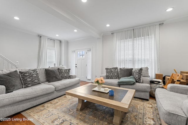 living room with ornamental molding, recessed lighting, and wood finished floors