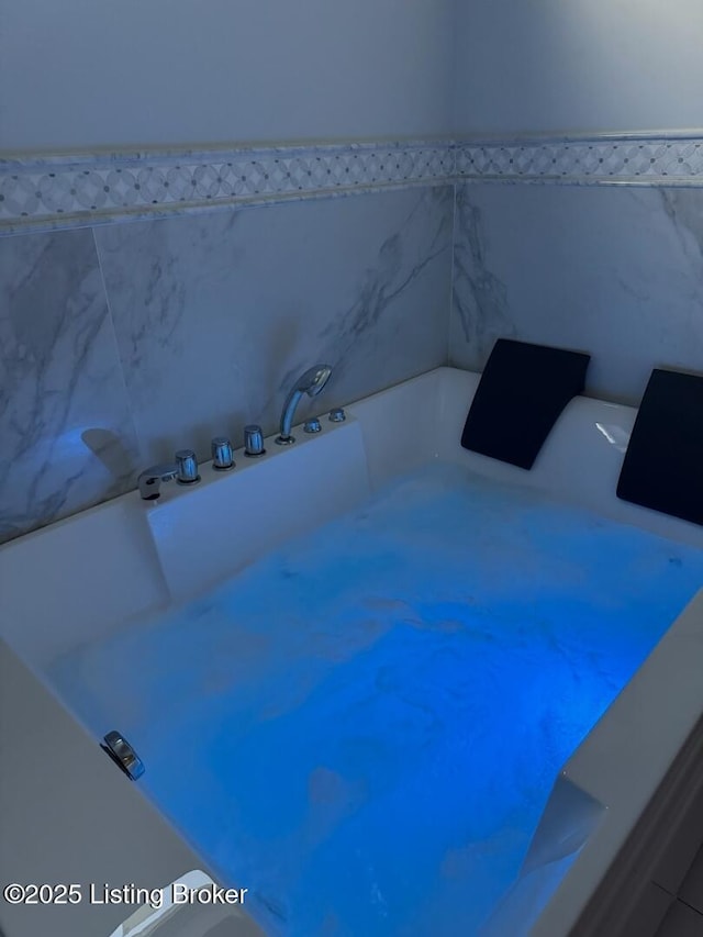 full bath with a bath