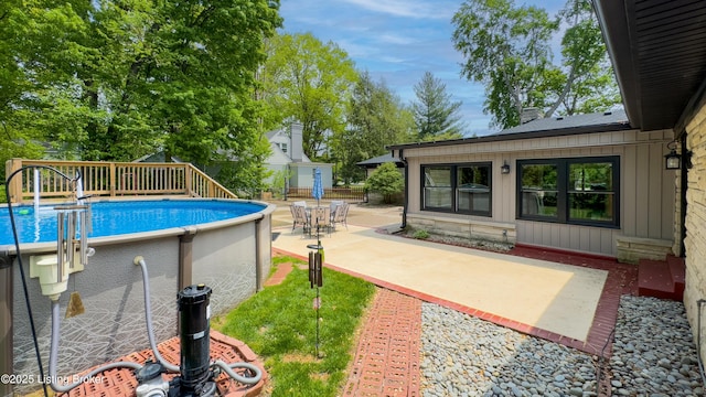 pool with a patio area
