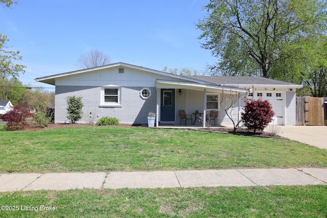 9500 Galene Dr, Louisville, KY 40299 - single story home featuring a front lawn, brick siding, a garage, a porch, and driveway