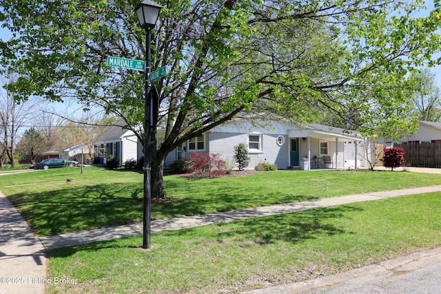 9500 Galene Dr, Louisville, KY 40299 - ranch-style home with fence, a front lawn, and brick siding