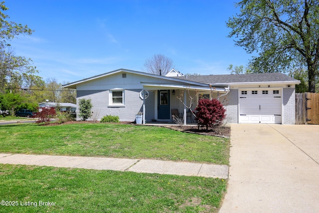 9500 Galene Dr, Louisville, KY 40299 - view of front of house with a front lawn, brick siding, a garage, a porch, and driveway