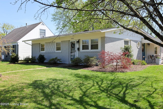 9500 Galene Dr, Louisville, KY 40299 - view of front of home with brick siding and a front lawn