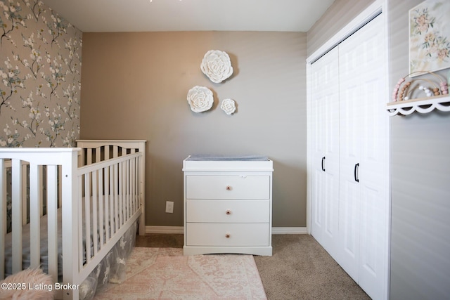 9500 Galene Dr, Louisville, KY 40299 - carpeted bedroom with a closet, a crib, baseboards, and wallpapered walls