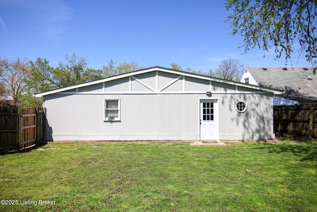 9500 Galene Dr, Louisville, KY 40299 - back of house with a fenced backyard and a lawn