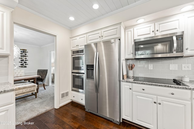 kitchen featuring backsplash, visible vents, appliances with stainless steel finishes, dark wood-style floors, and recessed lighting