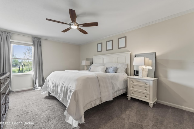 carpeted bedroom featuring baseboards, ornamental molding, and a ceiling fan
