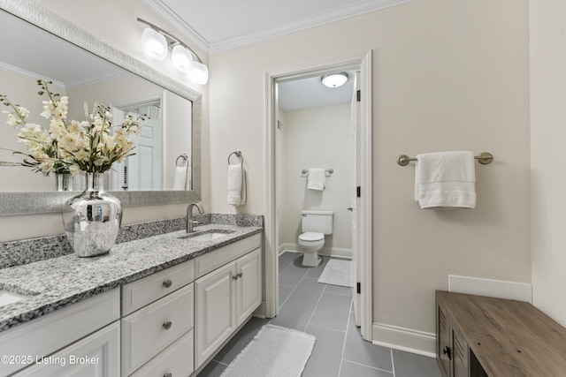 bathroom featuring double vanity, tile patterned flooring, a sink, toilet, and ornamental molding