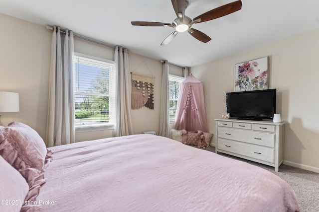 bedroom with baseboards, carpet, and ceiling fan