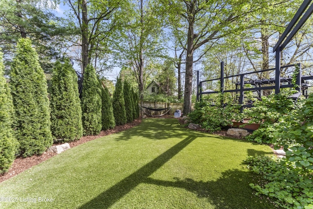 view of yard with fence
