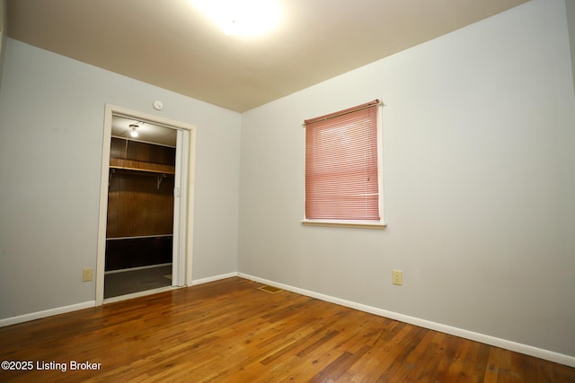 304 Manley Ave, Vine Grove, KY 40175 - unfurnished room with baseboards and wood finished floors