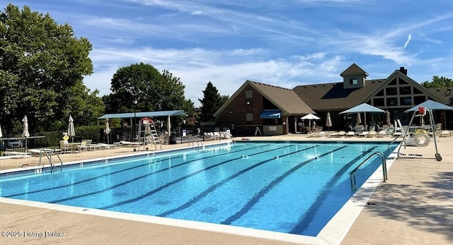 3115 Wynbrooke Cir, Louisville, KY 40241 - community pool featuring fence and a patio area