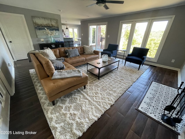 3115 Wynbrooke Cir, Louisville, KY 40241 - living area featuring a ceiling fan, dark wood-style flooring, and baseboards