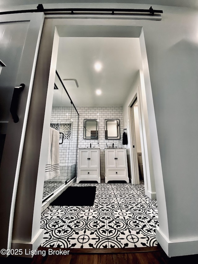 3115 Wynbrooke Cir, Louisville, KY 40241 - bathroom featuring a shower stall, vanity, and baseboards