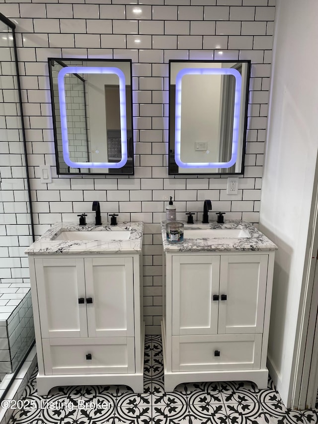 3115 Wynbrooke Cir, Louisville, KY 40241 - bathroom featuring tile walls, two vanities, and tile patterned flooring