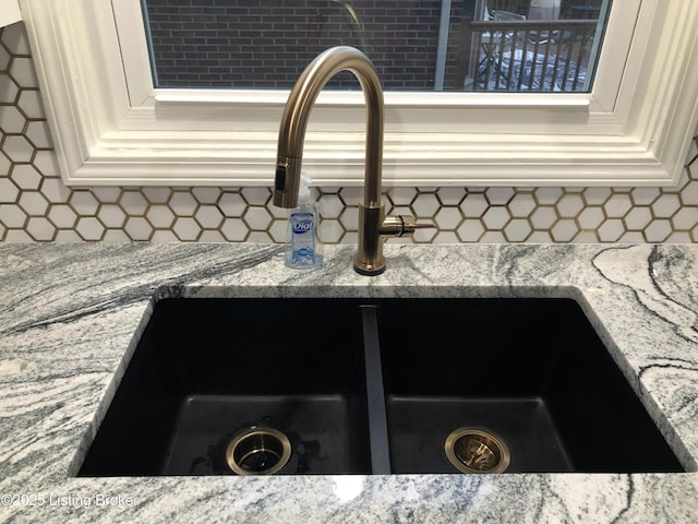 3115 Wynbrooke Cir, Louisville, KY 40241 - kitchen view of a sink, decorative backsplash, light stone countertops, and white cabinets