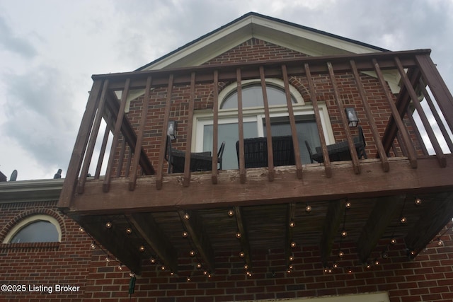3115 Wynbrooke Cir, Louisville, KY 40241 - rear view of house with brick siding and a balcony
