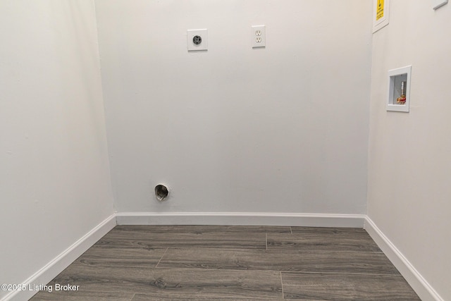 laundry area featuring laundry area, wood finished floors, baseboards, hookup for a washing machine, and hookup for an electric dryer