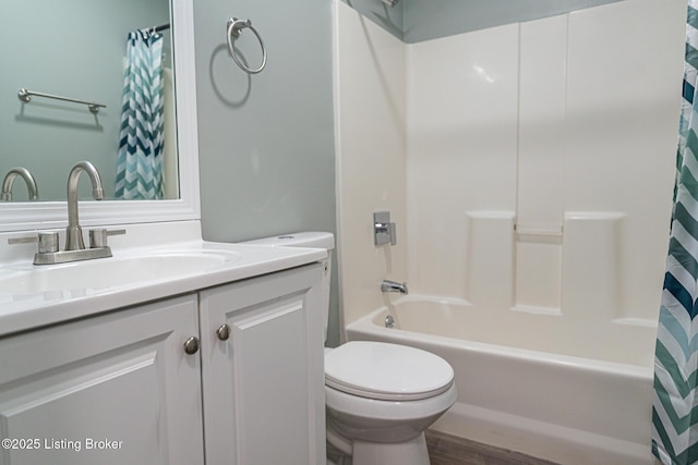 full bathroom with toilet, shower / bath combination with curtain, wood finished floors, and vanity